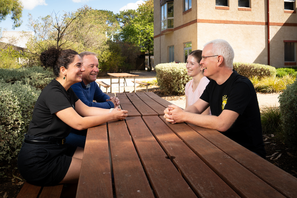 Dr Sima Mousavi, Professor Malcolm Sambridge, Jasmine Zollinger and Associate Professor David Heslop from ANU Research School of Earth Sciences. Photo: Nic Vevers/ANU Four scientists at a table