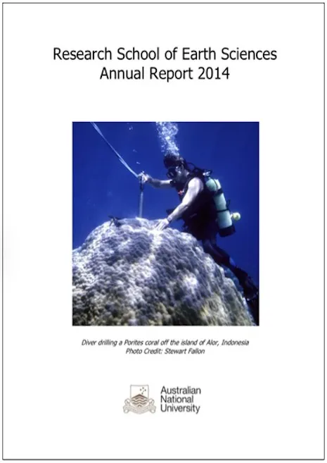 Cover of the Research School of Earth Sciences Annual Report 2014 showing a diver drilling a coral off the island of Alor, Indonesia.