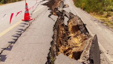 road disrupted by earthquake.