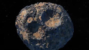 An illustration depicts the 140-mile-wide (226-kilometer-wide) asteroid Psyche. Photo by NASA / JPL-Caltech / ASU